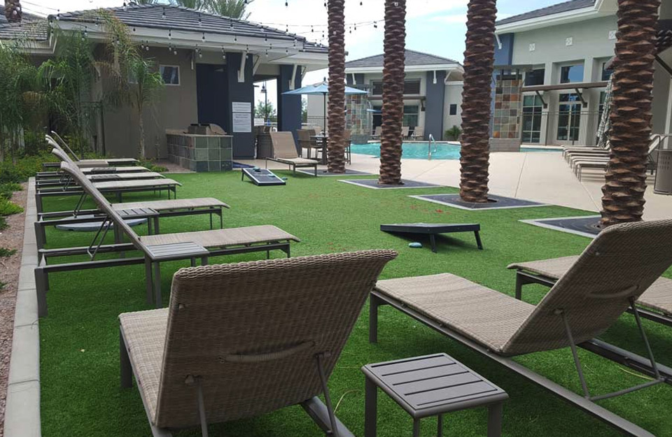 Poolside Area featuring artificial grass 